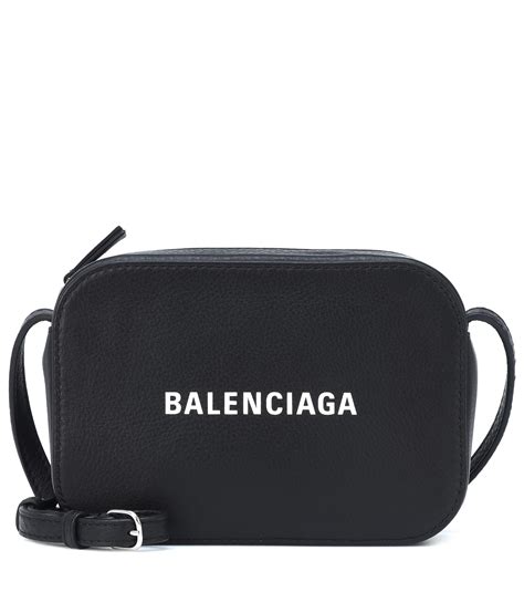 balenciaga black crossbody bag.